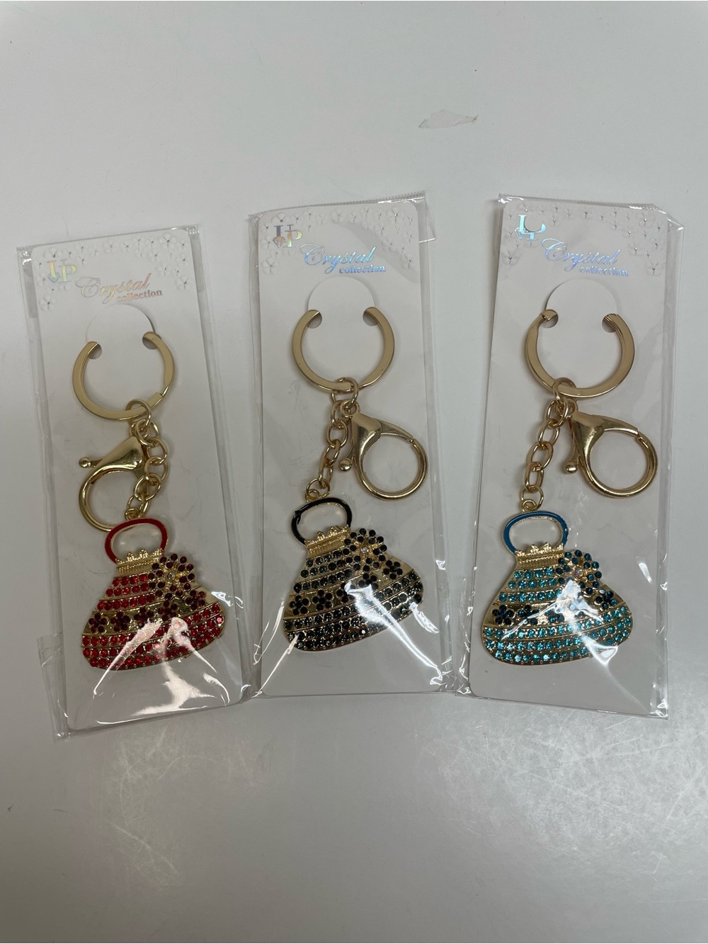 Gold Keychain Purse Charms in Red, Black & Blue Set of 3 - Picture 2 of 3